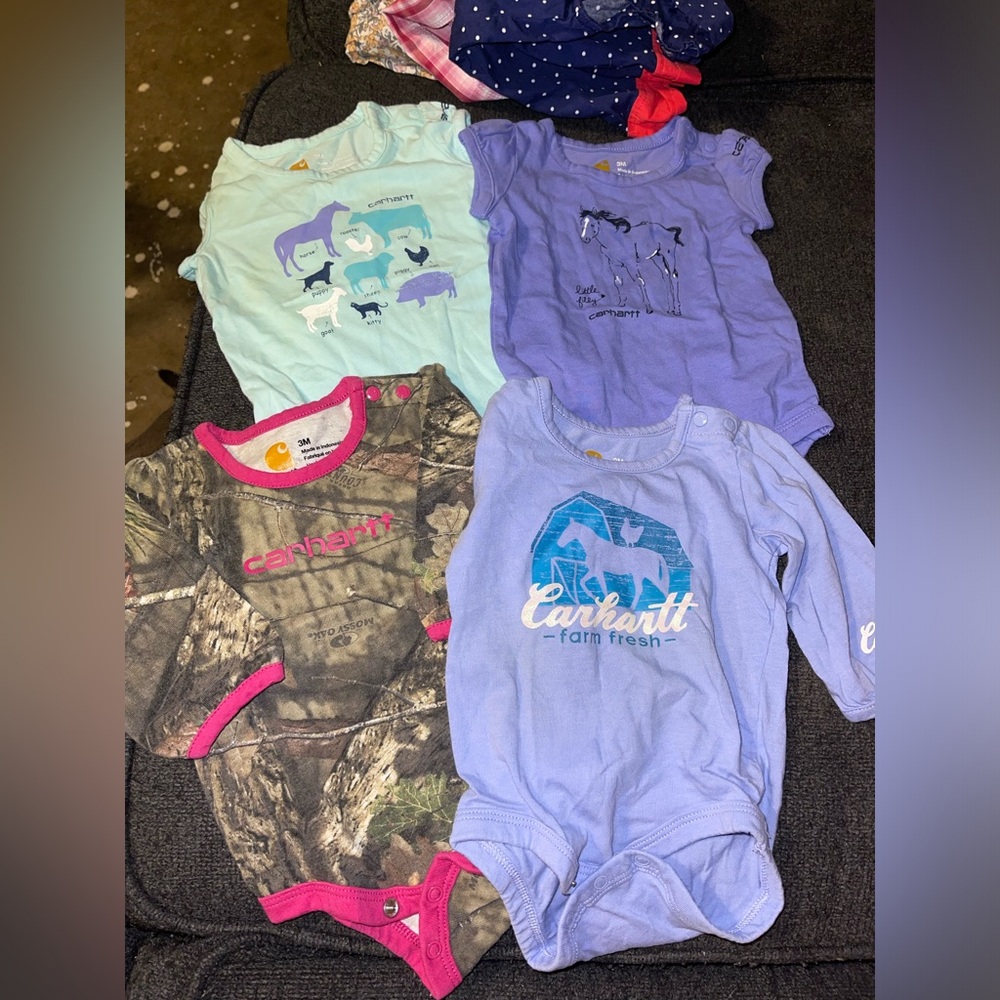 Four onesies. All carhartt 3M